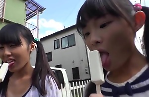 Tiny japanese schoolgirl eating ice