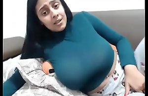 Hot girl encircling amazing tits masturbating on