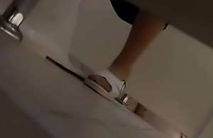 Spy in a WC in a university  in
