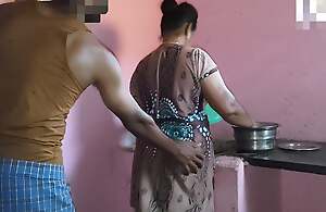 Aunty was working in along to kitchen