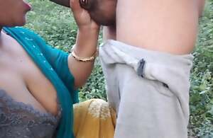 Desi jungle bhabhi mincing dirty game of sex with a schoolboy relative to the jungle and also did blowjob.