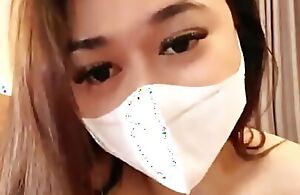 Of the time Indonesia Viral dame wearing a mask is